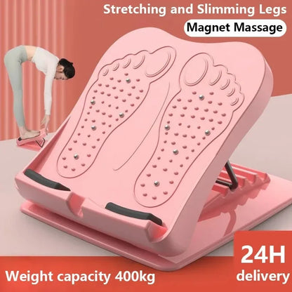 Pink foot stretcher with magnet massage feature on a plain background