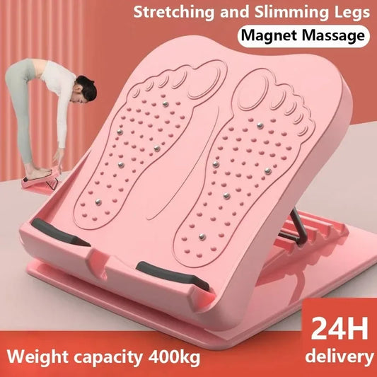 Pink foot stretcher with magnet massage feature on a plain background